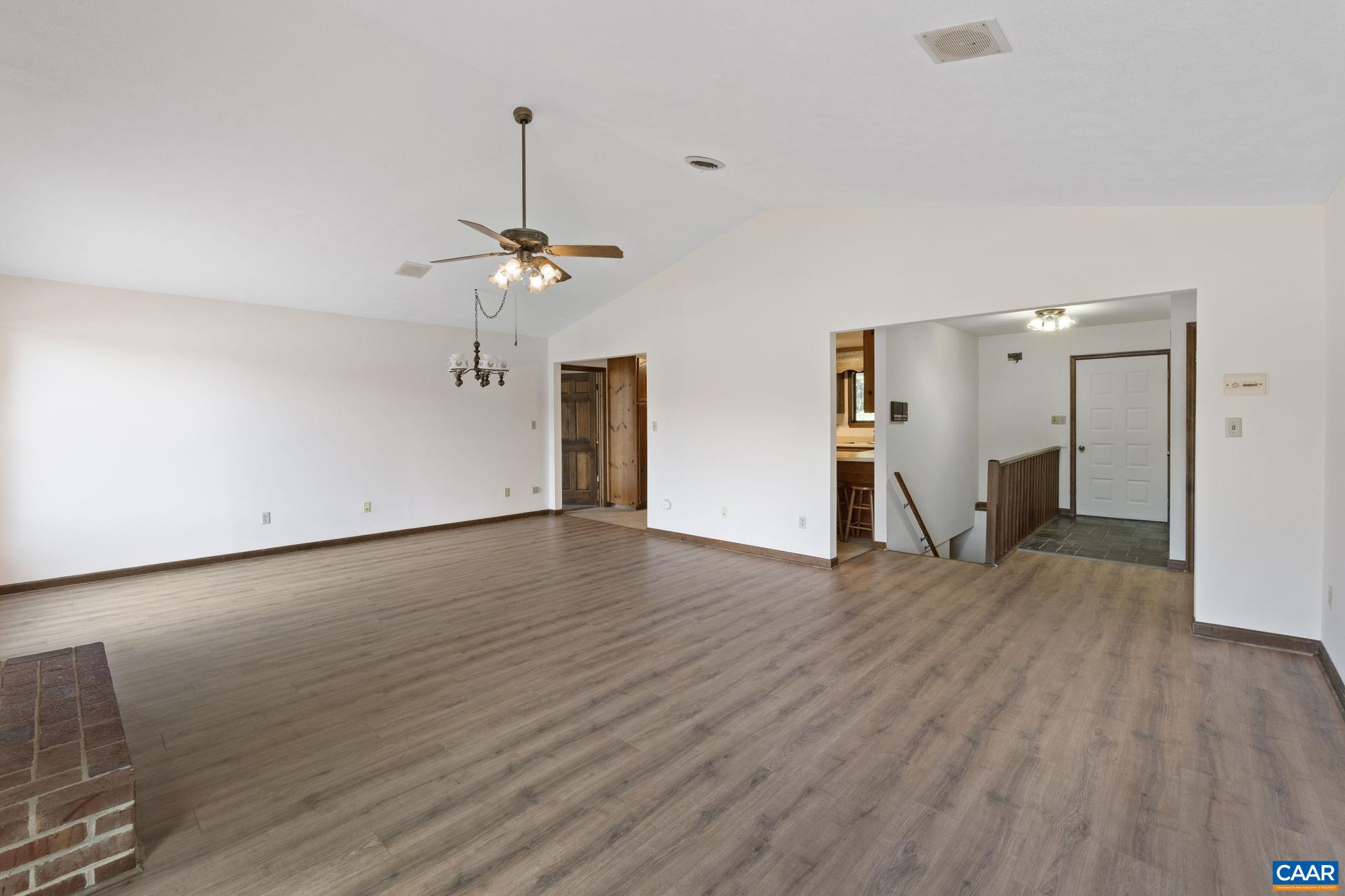 43 Tanglewood Road Palmyra, VA 22963 - Photo 21 of 64 a view of a room with wooden floor and ceiling fan