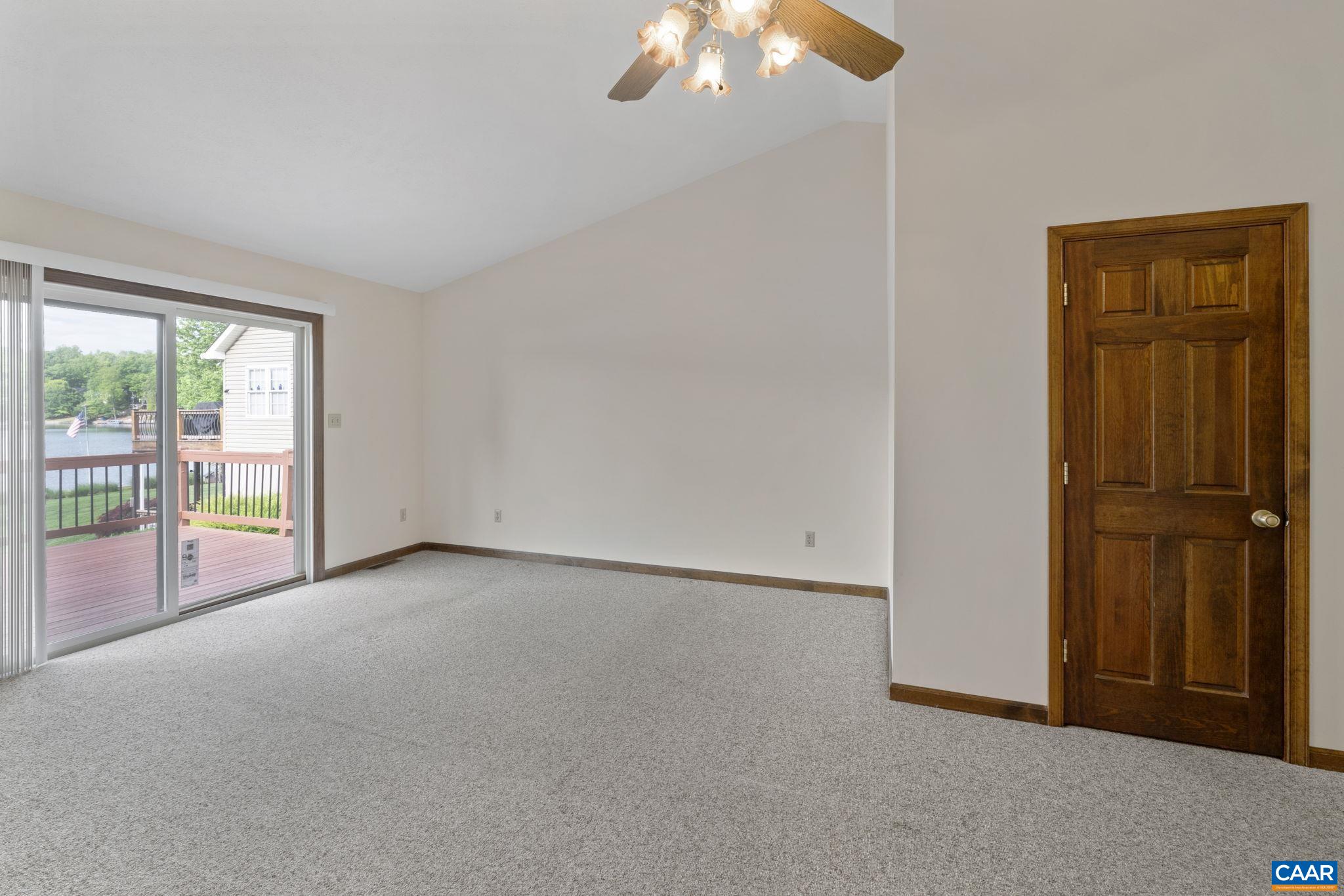 43 Tanglewood Road Palmyra, VA 22963 - Photo 26 of 64 an empty room with chandelier fan