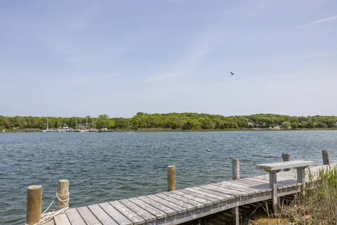 a view of balcony and yard