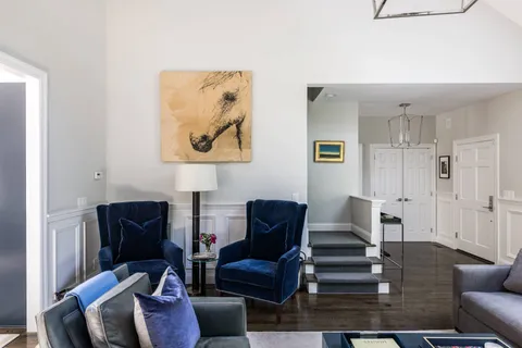 a living room with furniture and a couch