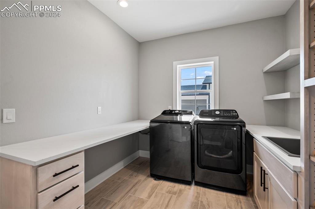 18775 Sweet Road Peyton, CO 80831 - Photo 13 of 50 a view of a kitchen with stove and cabinets