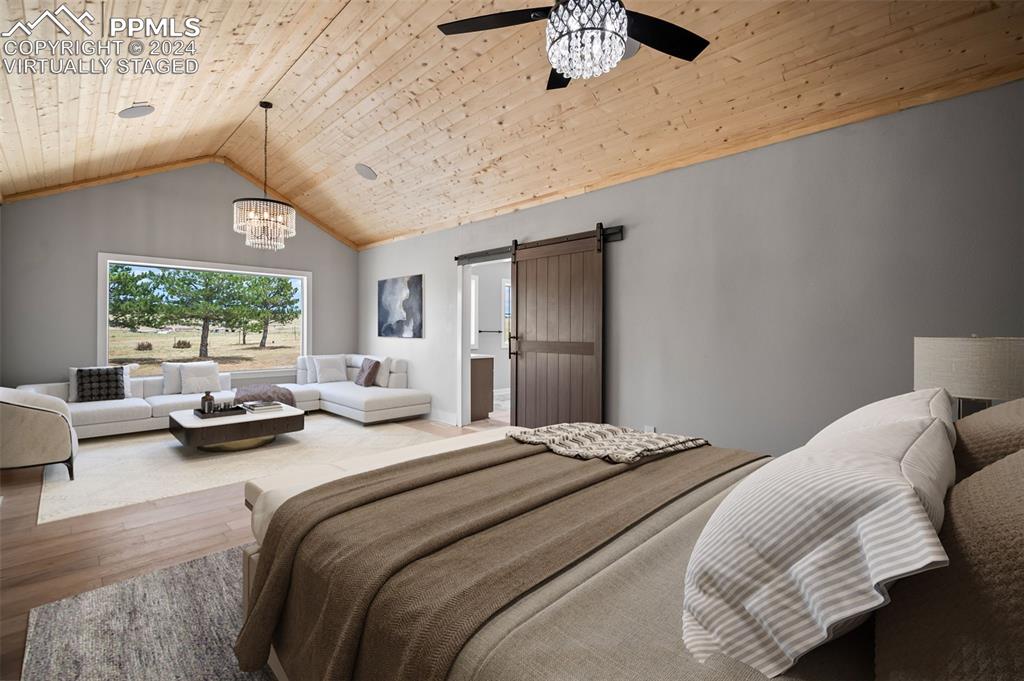 18775 Sweet Road Peyton, CO 80831 - Photo 17 of 50 a bedroom with furniture and a window