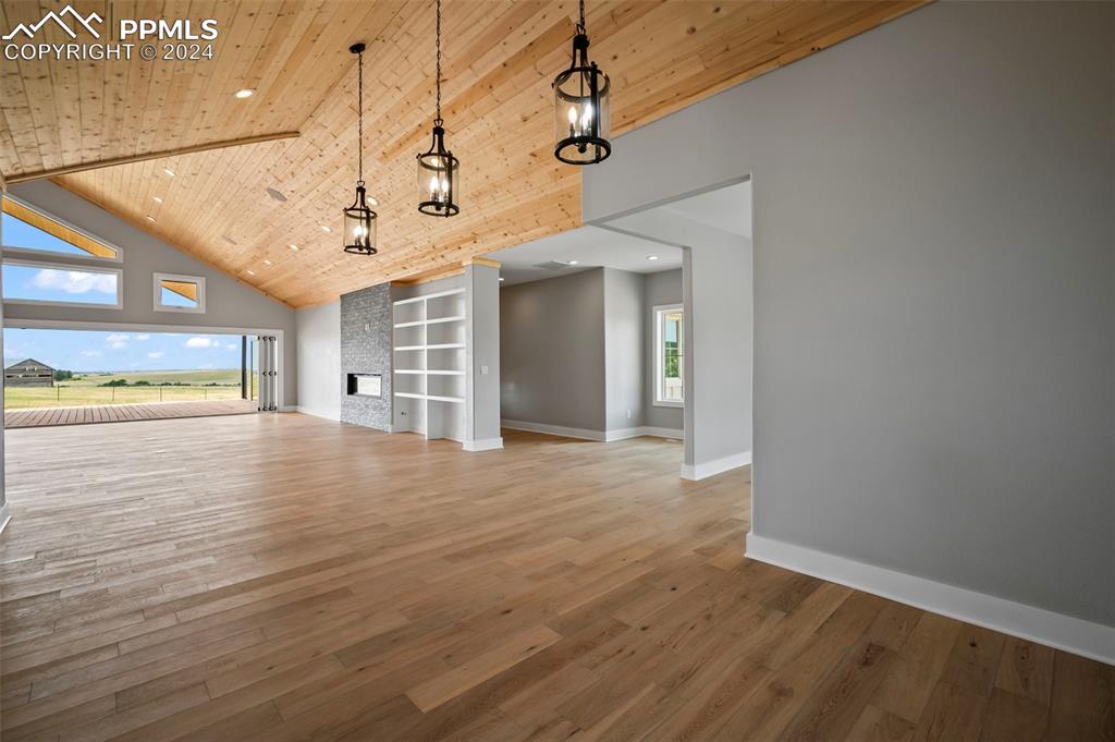 18775 Sweet Road Peyton, CO 80831 - Photo 21 of 50 a view of a room with wooden floor