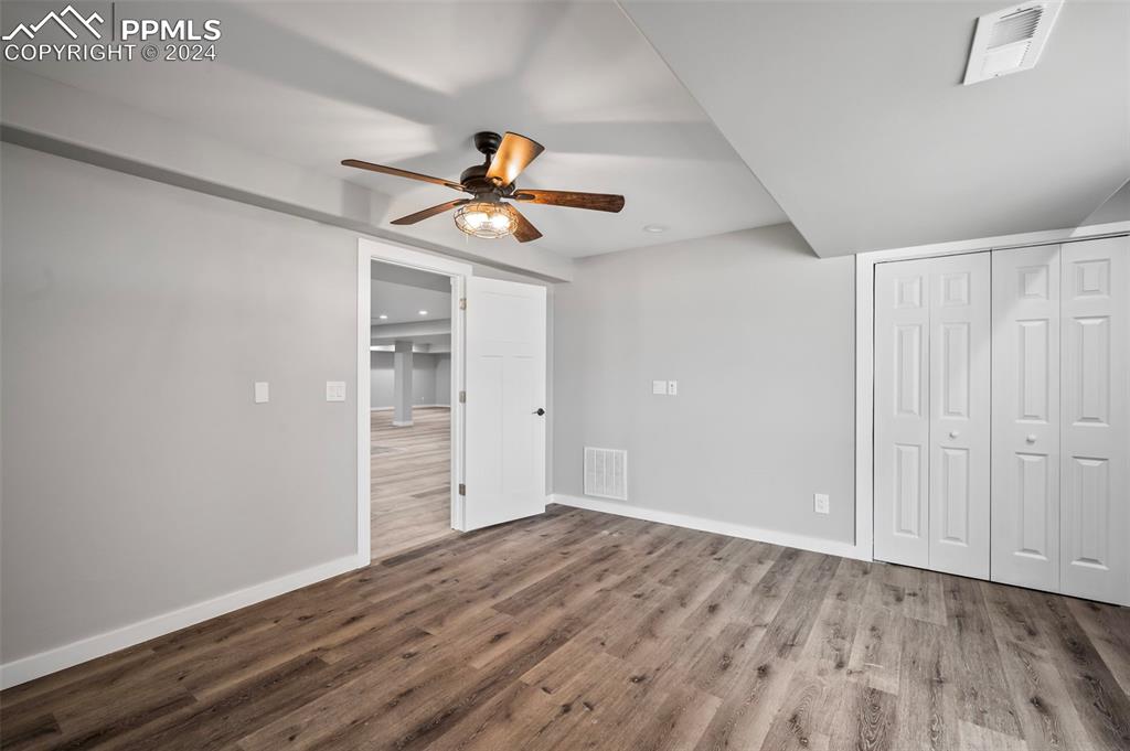 18775 Sweet Road Peyton, CO 80831 - Photo 30 of 50 wooden floor in an empty room