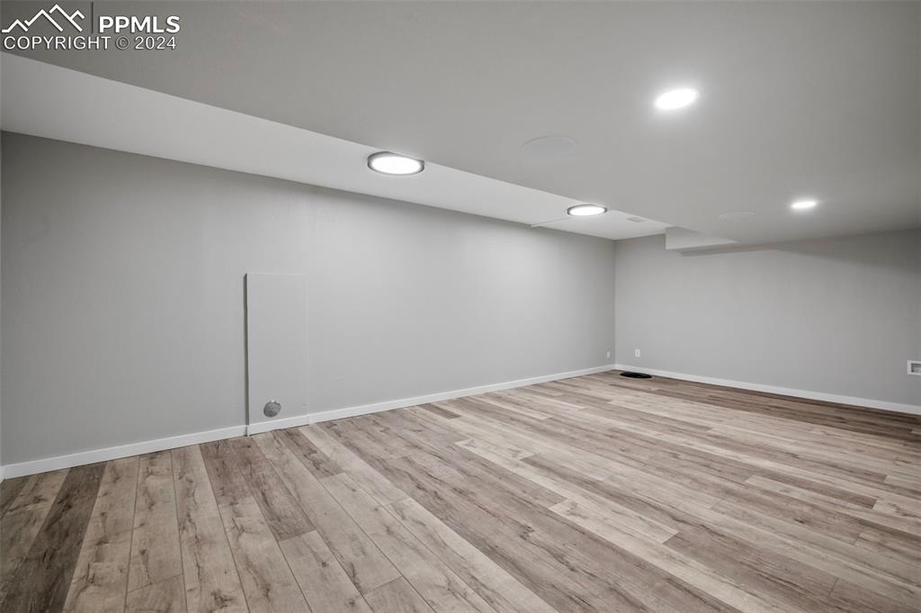 18775 Sweet Road Peyton, CO 80831 - Photo 38 of 50 a view of empty room with wooden floor