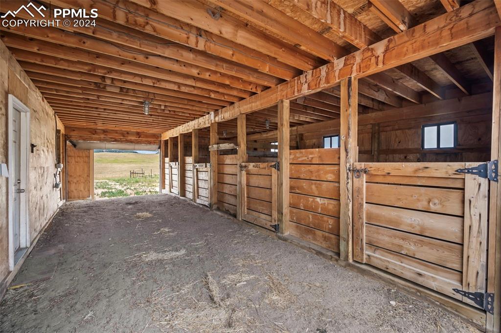 18775 Sweet Road Peyton, CO 80831 - Photo 47 of 50 a view of an empty room with furniture and a window