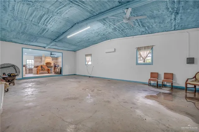a view of livingroom with furniture and a window