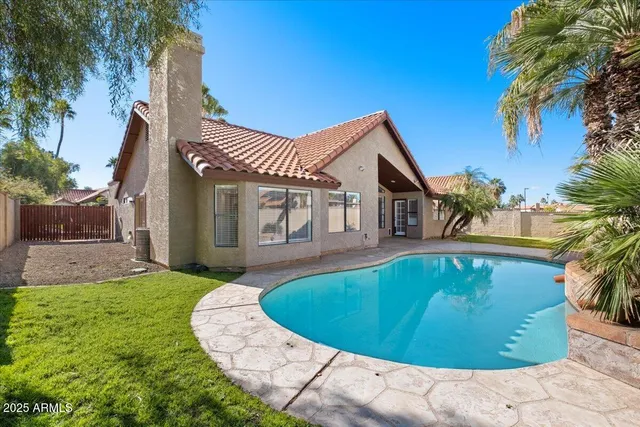 a view of a house with a swimming pool