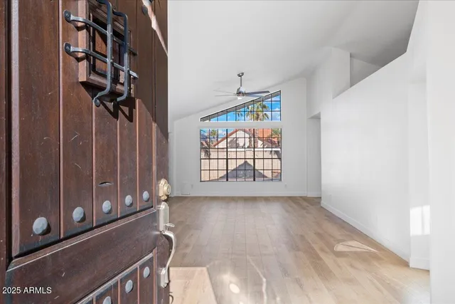 a view of an empty room with a window