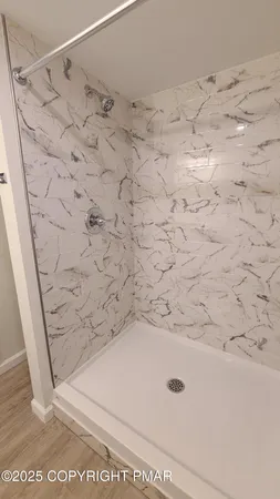 a bathroom with a bathtub