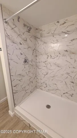 a bathroom with a bathtub