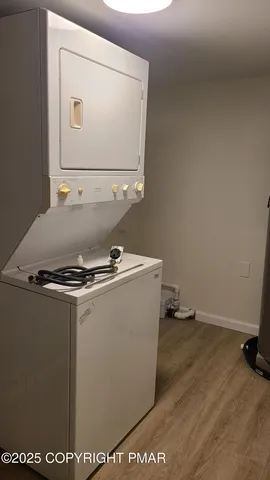 a view of room with washer and dryer