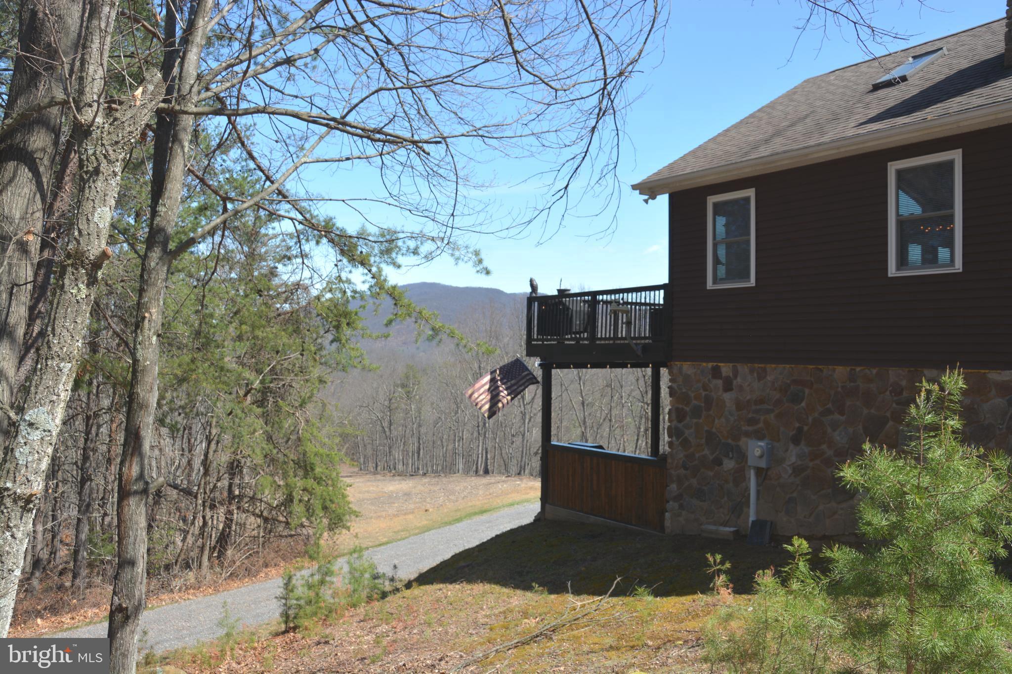 400 Locust Ridge Moorefield, WV 26836 - Photo 11 of 87 a front view of a house with a yard