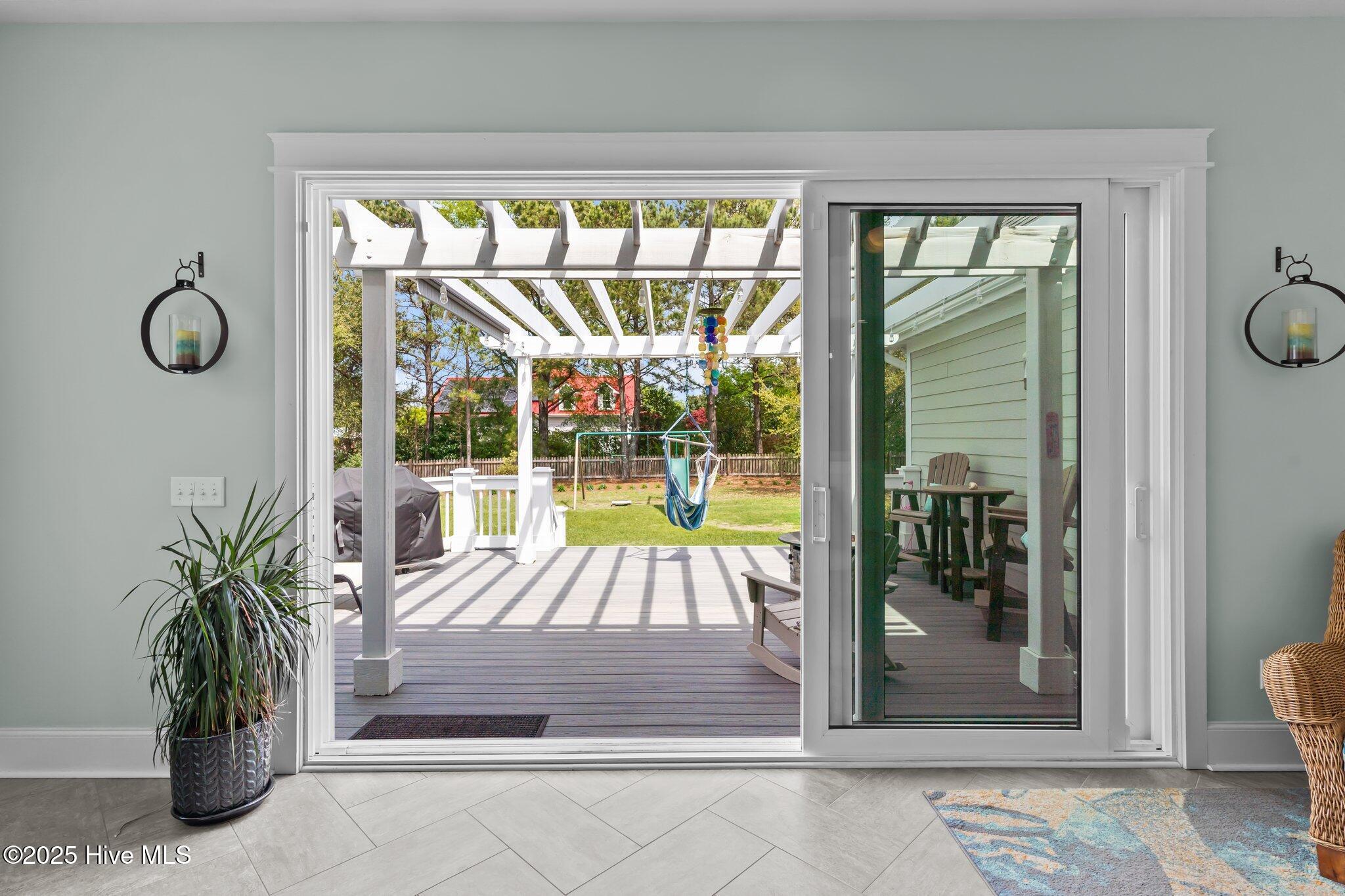 114 Sundance Circle Hampstead, NC 28443 - Photo 11 of 52 Gliding sunroom doors