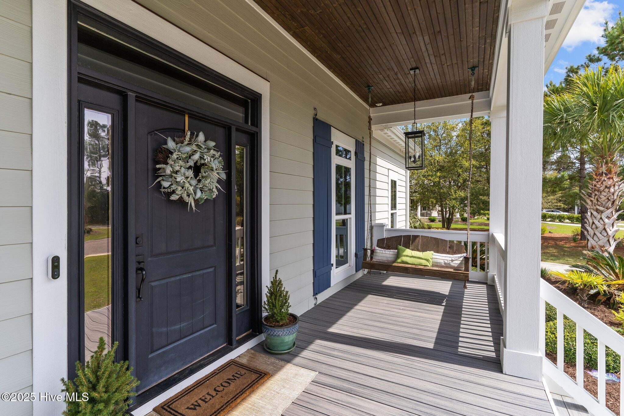 114 Sundance Circle Hampstead, NC 28443 - Photo 3 of 52 Swing porch
