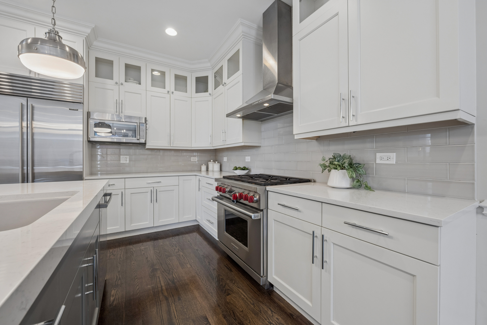 2740 North Seminary Avenue, Unit 1 Chicago, IL 60614 - Photo 21 of 46 a kitchen with stainless steel appliances granite countertop a sink a stove and cabinets