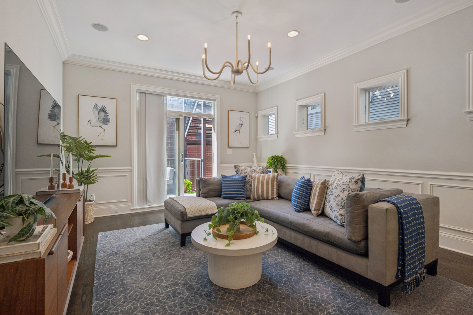 2740 North Seminary Avenue, Unit 1 Chicago, IL 60614 - Photo 25 of 46 a living room with furniture and a chandelier
