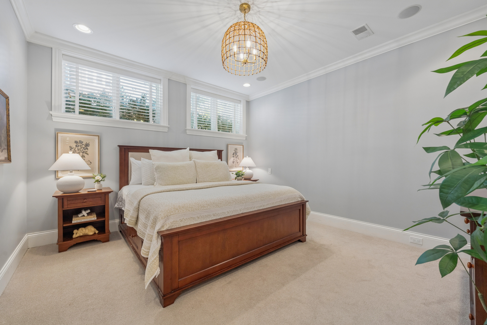 2740 North Seminary Avenue, Unit 1 Chicago, IL 60614 - Photo 33 of 46 a bedroom with a bed window and a chandelier