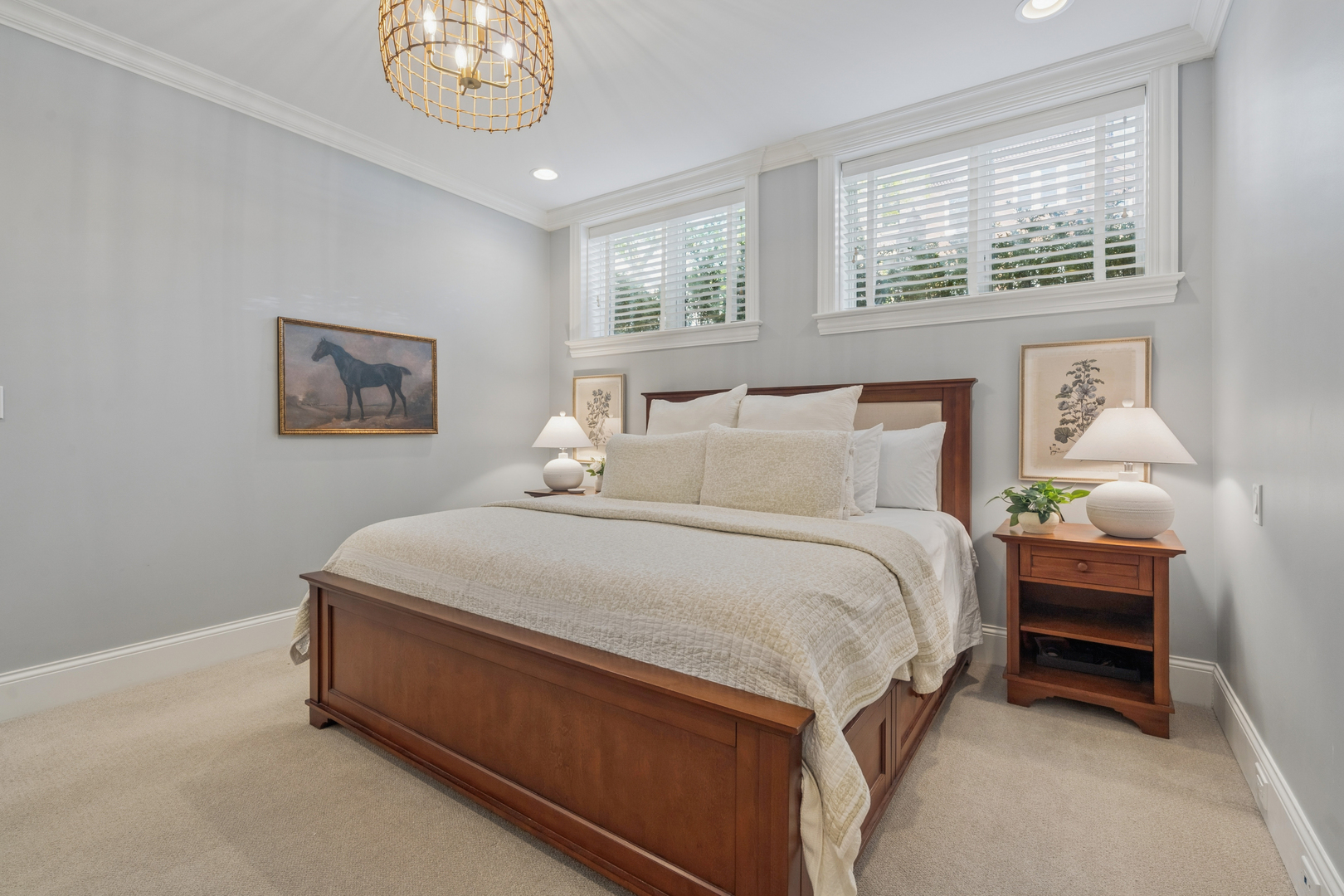 2740 North Seminary Avenue, Unit 1 Chicago, IL 60614 - Photo 35 of 46 a bedroom with a bed and a chandelier