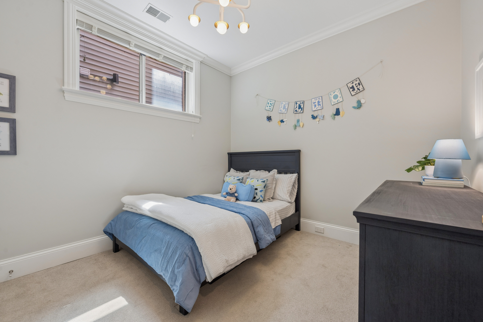 2740 North Seminary Avenue, Unit 1 Chicago, IL 60614 - Photo 40 of 46 a bedroom with a bed and window