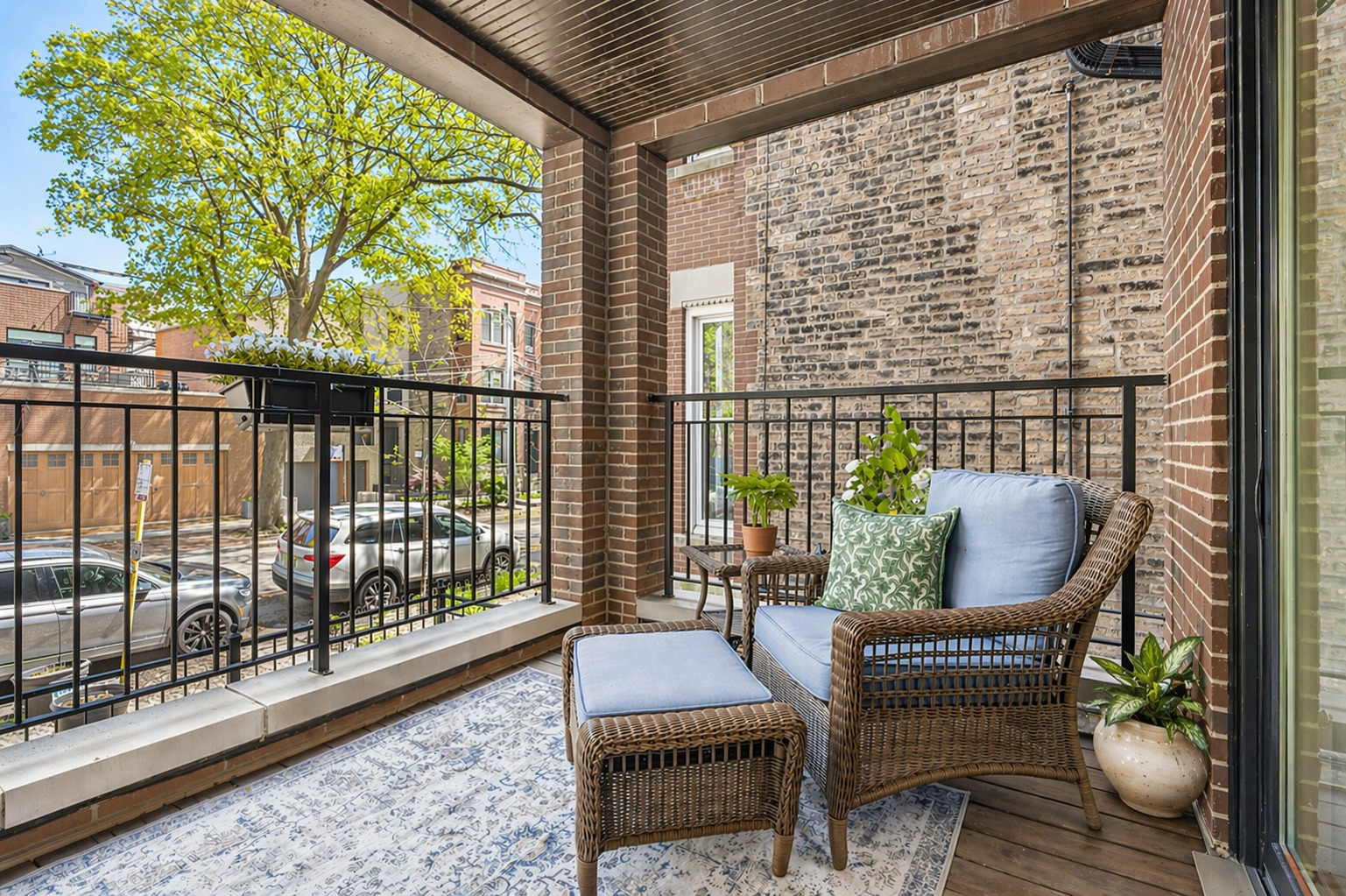 2740 North Seminary Avenue, Unit 1 Chicago, IL 60614 - Photo 9 of 46 a balcony with furniture and wooden floor