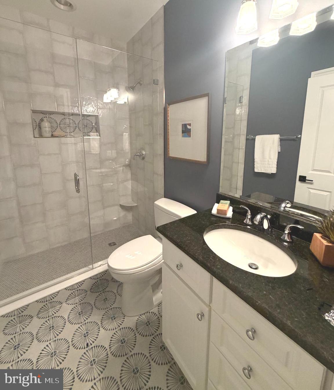 9153 Riesley Lane Vienna, VA 22182 - Photo 26 of 28 Renovated lower level full bathroom