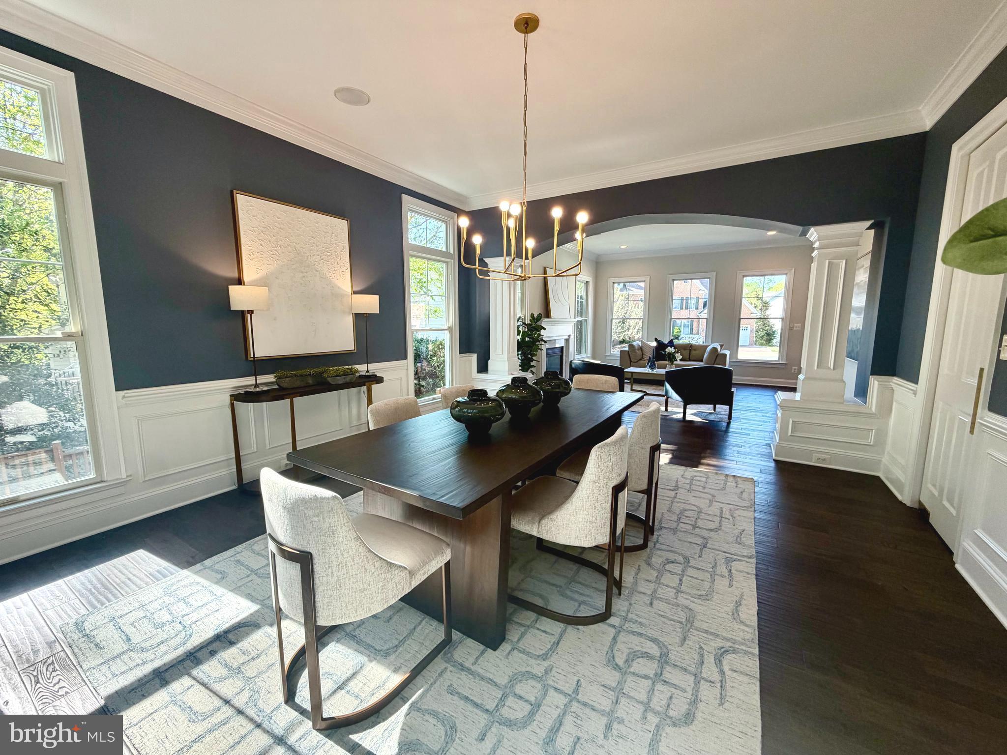 9153 Riesley Lane Vienna, VA 22182 - Photo 4 of 28 Dining room with a chic new light fixture