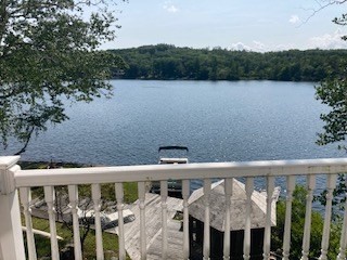 24 Indian Stone Road Phillipston, MA 01331 - Photo 3 of 21 a view of a balcony with chairs and wooden fence