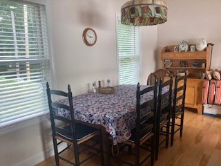 24 Indian Stone Road Phillipston, MA 01331 - Photo 7 of 21 a view of a dining room with furniture and wooden floor
