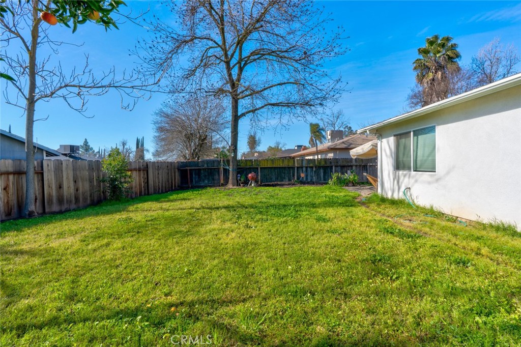 1840 Cheyenne Drive Merced, CA 95348 - Photo 59 of 90 a view of a house with backyard and a tree