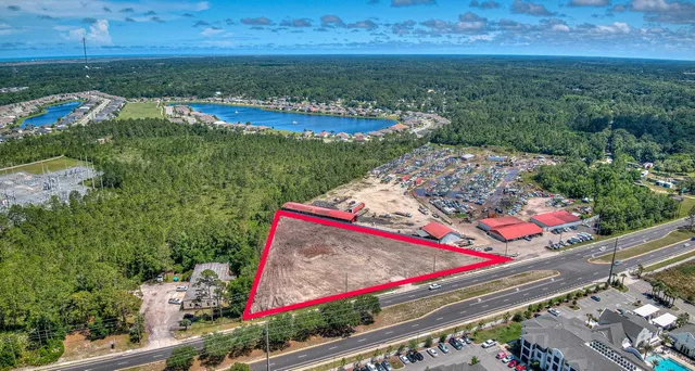 an outdoor space with furniture and umbrella