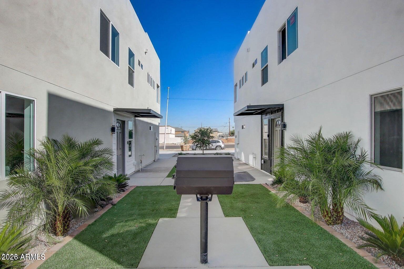 a view of a yard in front of house