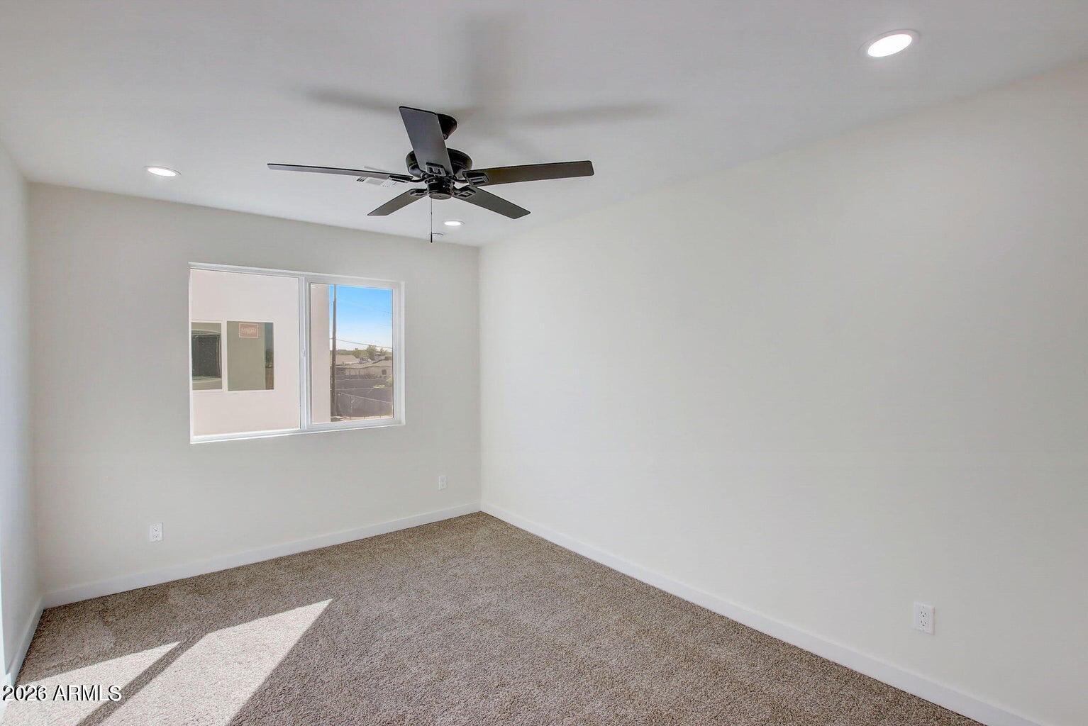 2509 East Broadway Road Phoenix, AZ 85040 - Photo 36 of 47 a view of an empty room with a window