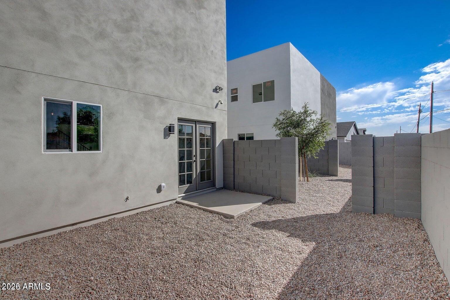 2509 East Broadway Road Phoenix, AZ 85040 - Photo 39 of 47 a view of a house with a yard