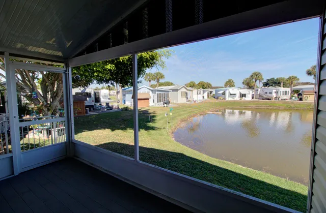 a view of swimming pool from a balcony