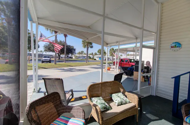 a room with furniture and a flat screen tv