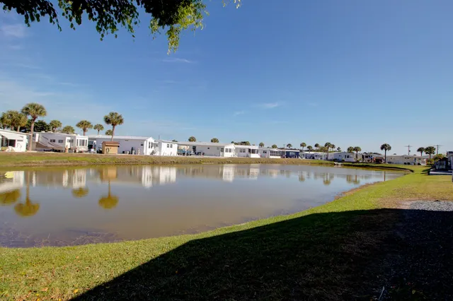 a view of a lake with outdoor space