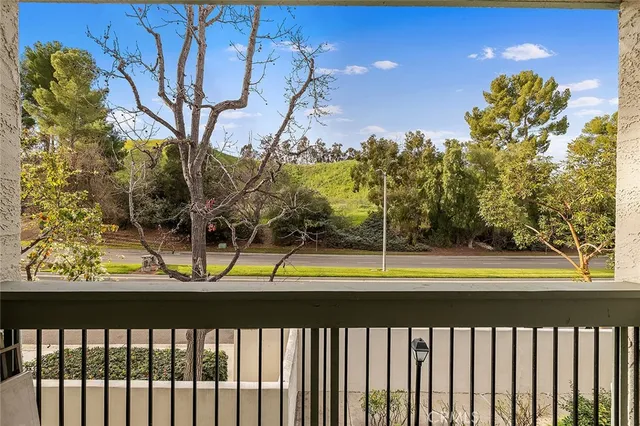 a view of a yard with swimming pool and sitting area