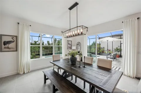 a view of a patio with a table and chairs