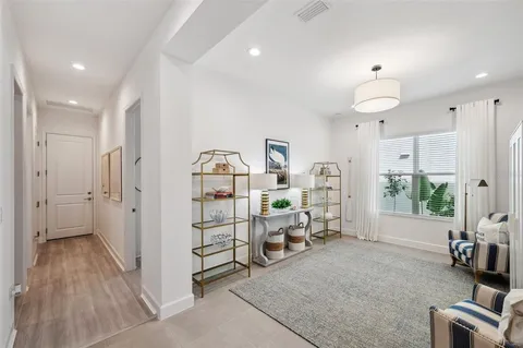 a bathroom with a bathtub and a sink