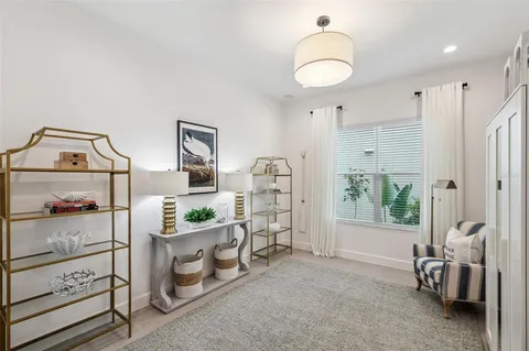 a spacious bathroom with a bathtub and a shower