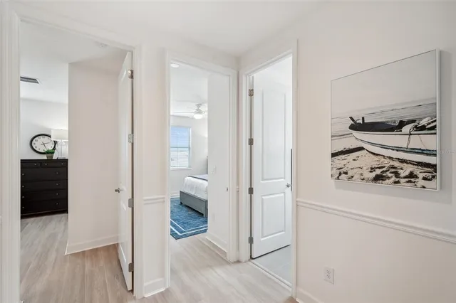 a bedroom with a bed and a desk