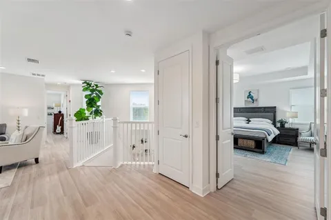 a view of a swimming pool with a patio and a yard