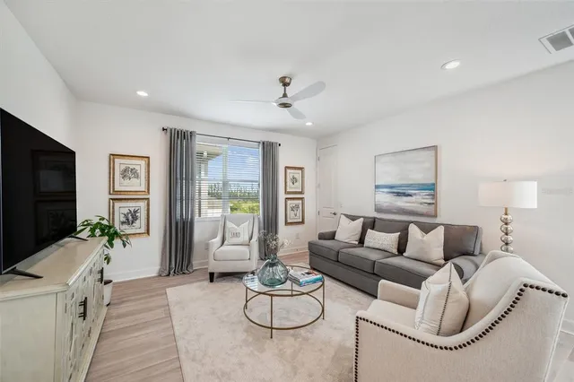 a view of a swimming pool with a table and chairs