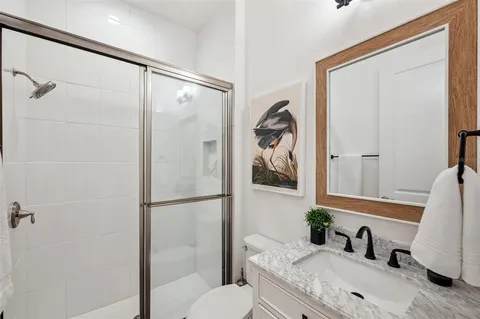 an aerial view of a house with yard swimming pool and outdoor seating