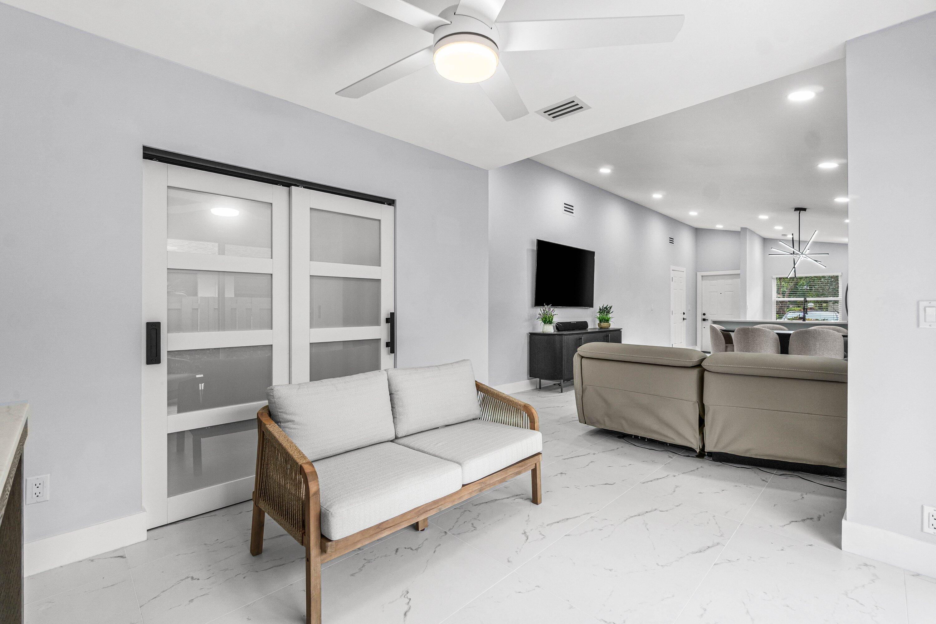 8137 Windgate Drive Boca Raton, FL 33496 - Photo 16 of 32 ENLCOSED FL ROOM/DEN
