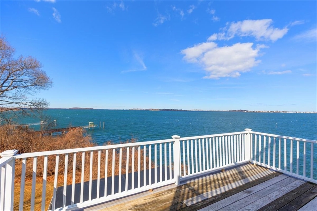 55 Whiton Avenue Hingham, MA 02043 - Photo 27 of 30 a balcony with wooden floor and lake view
