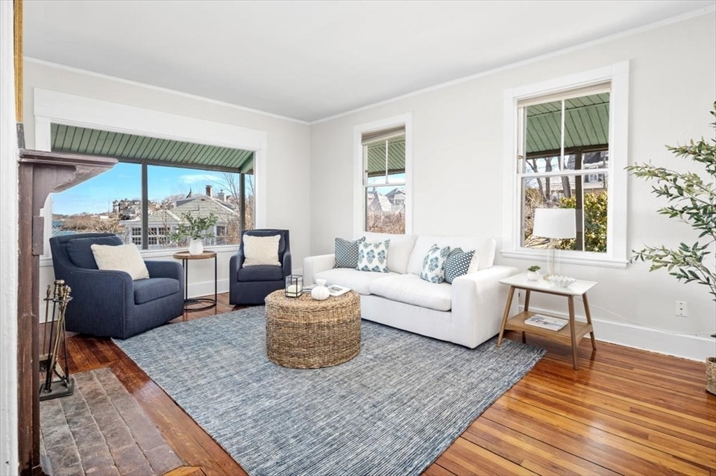 55 Whiton Avenue Hingham, MA 02043 - Photo 7 of 30 a living room with furniture and a large window