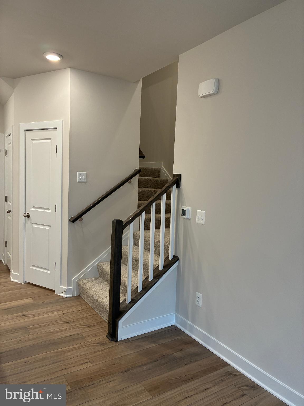 20823 Cloongee Terrace Sterling, VA 20166 - Photo 8 of 12 a view of entryway with wooden floor