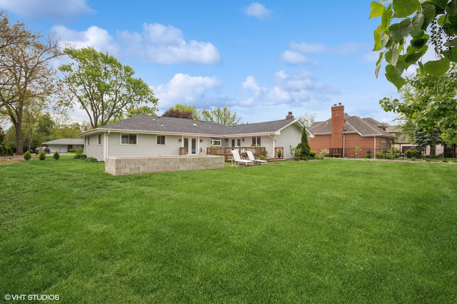 2050 Beechnut Road Northbrook, IL 60062 - Photo 16 of 18 a view of a house with a yard and sitting area